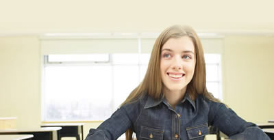 An image of a student sitting at desk